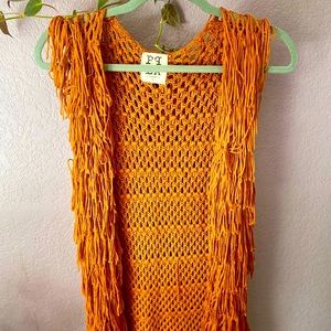 Rust colored fringe vest. Size Small.